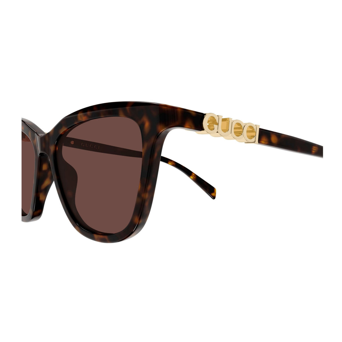 Close-up of the Gucci logo on the temple of the GG2032S havana cat-eye sunglasses