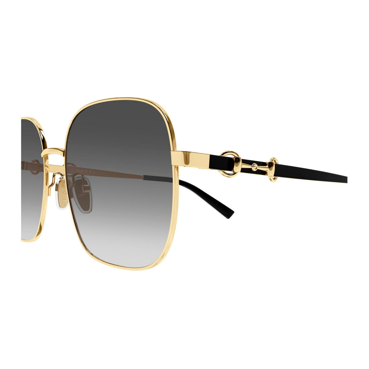 Close-up of the Gucci logo on the temple of the GG2053S gold square sunglasses