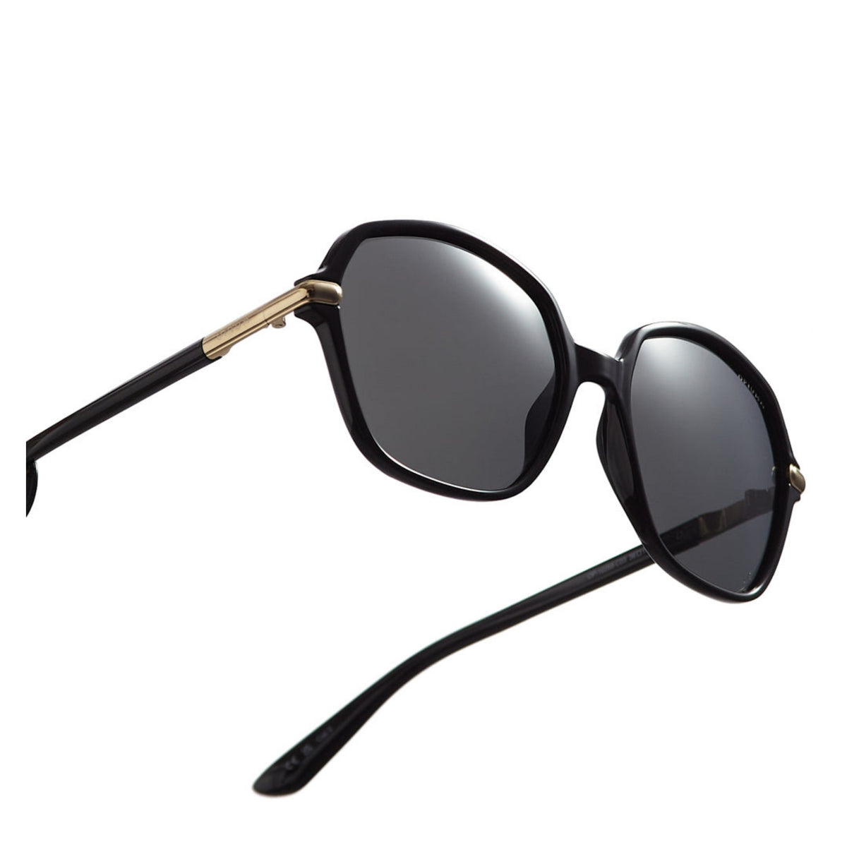 Close-up of the Opium logo on the temple of the OP10268 black cat-eye sunglasses