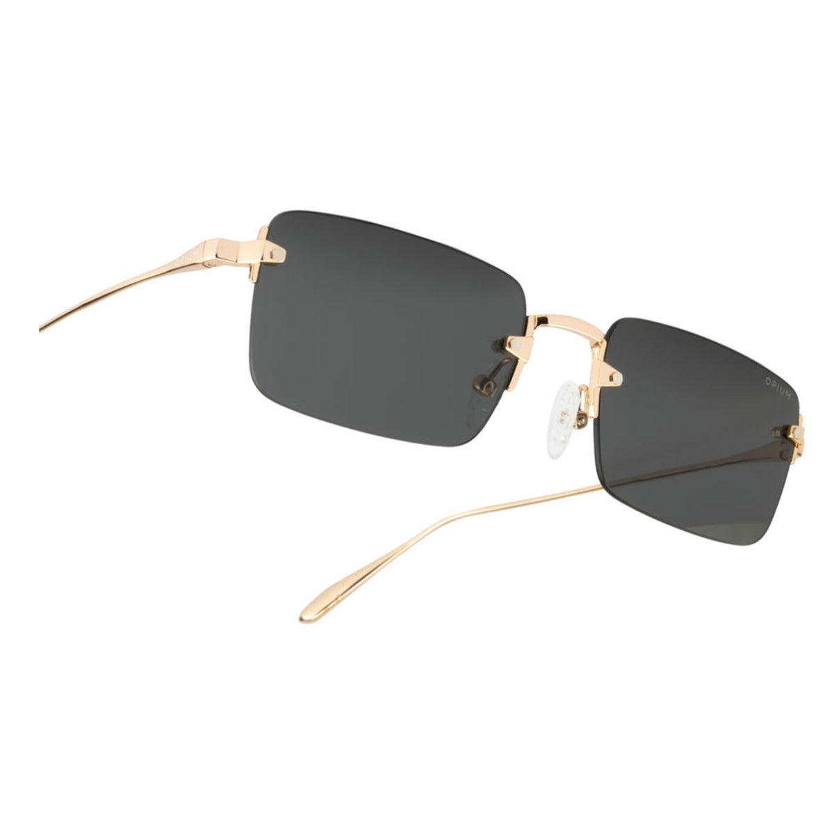 Close-up of the Opium logo on the temple of the OP10374 gold rimless sunglasses