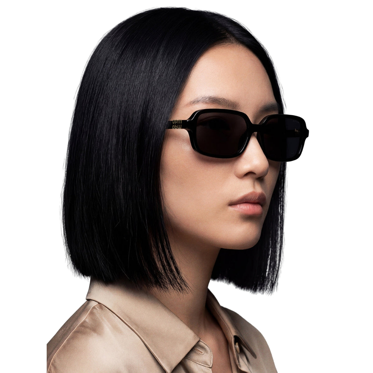 Woman wearing Opium OP10390 black rectangle sunglasses