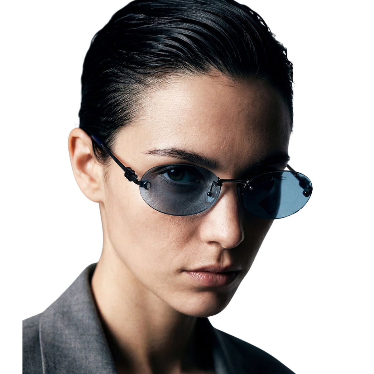 Woman wearing Opium OP10401 gunmetal rimless sunglasses