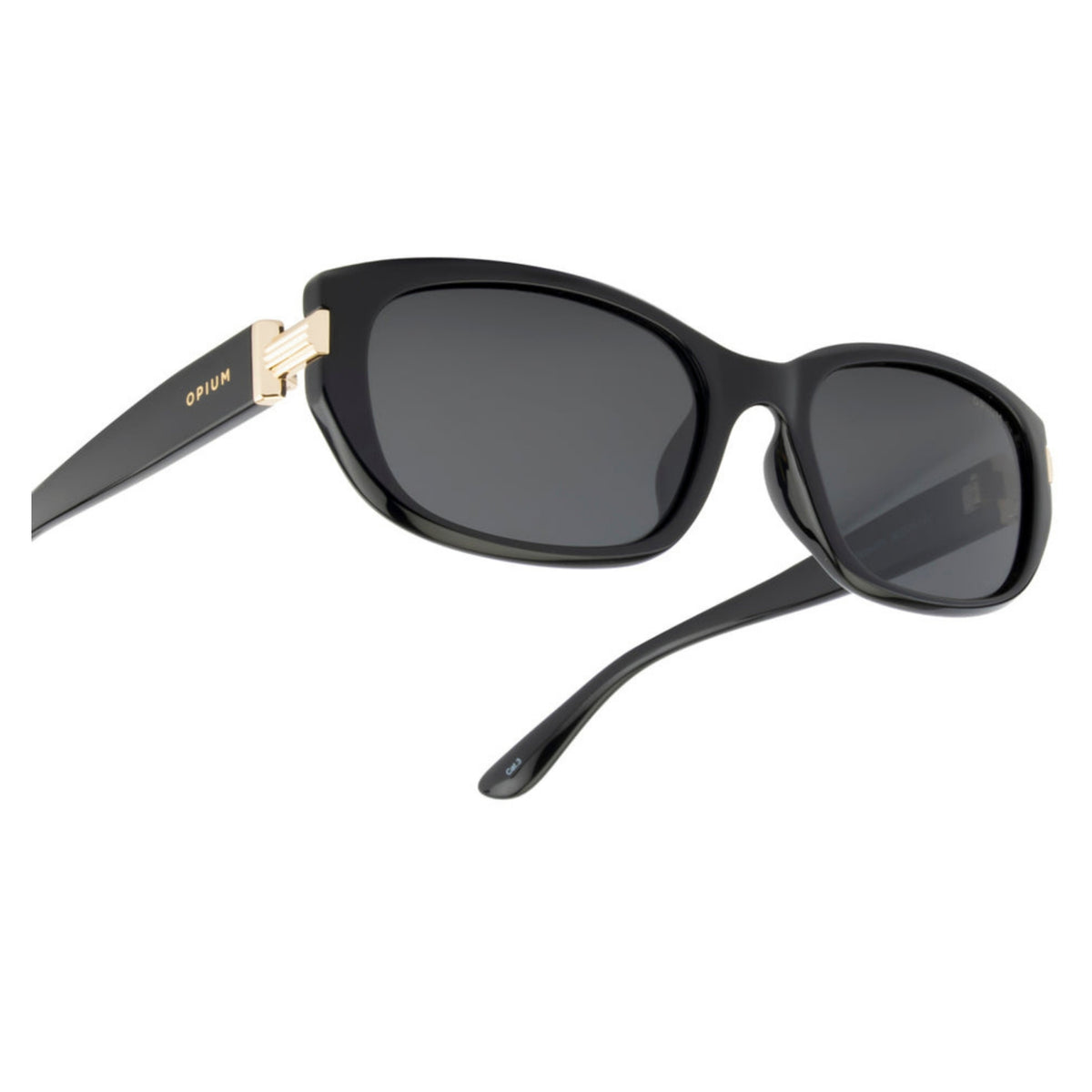 Close-up of the Opium logo on the temple of the OP10424 black cat-eye sunglasses