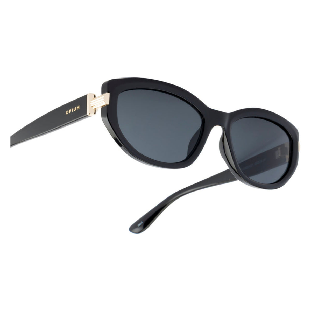 Close-up of the Opium logo on the temple of the OP10425 black cat-eye sunglasses