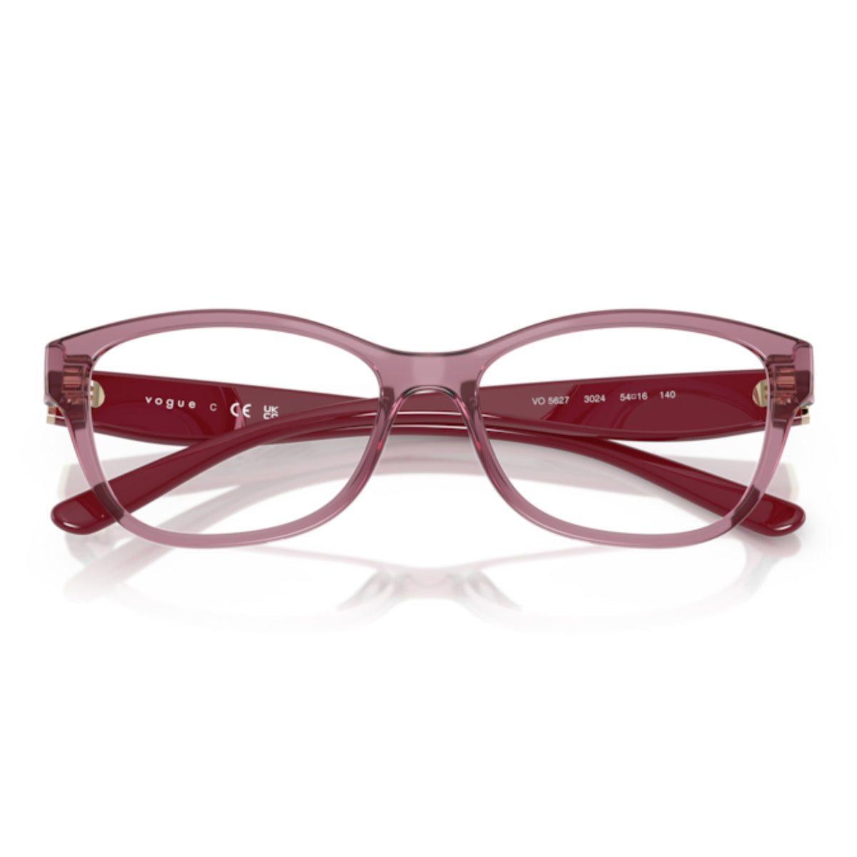 Vogue VO5627 transparent dark pink cat-eye eyeglasses, front view with the temples folded