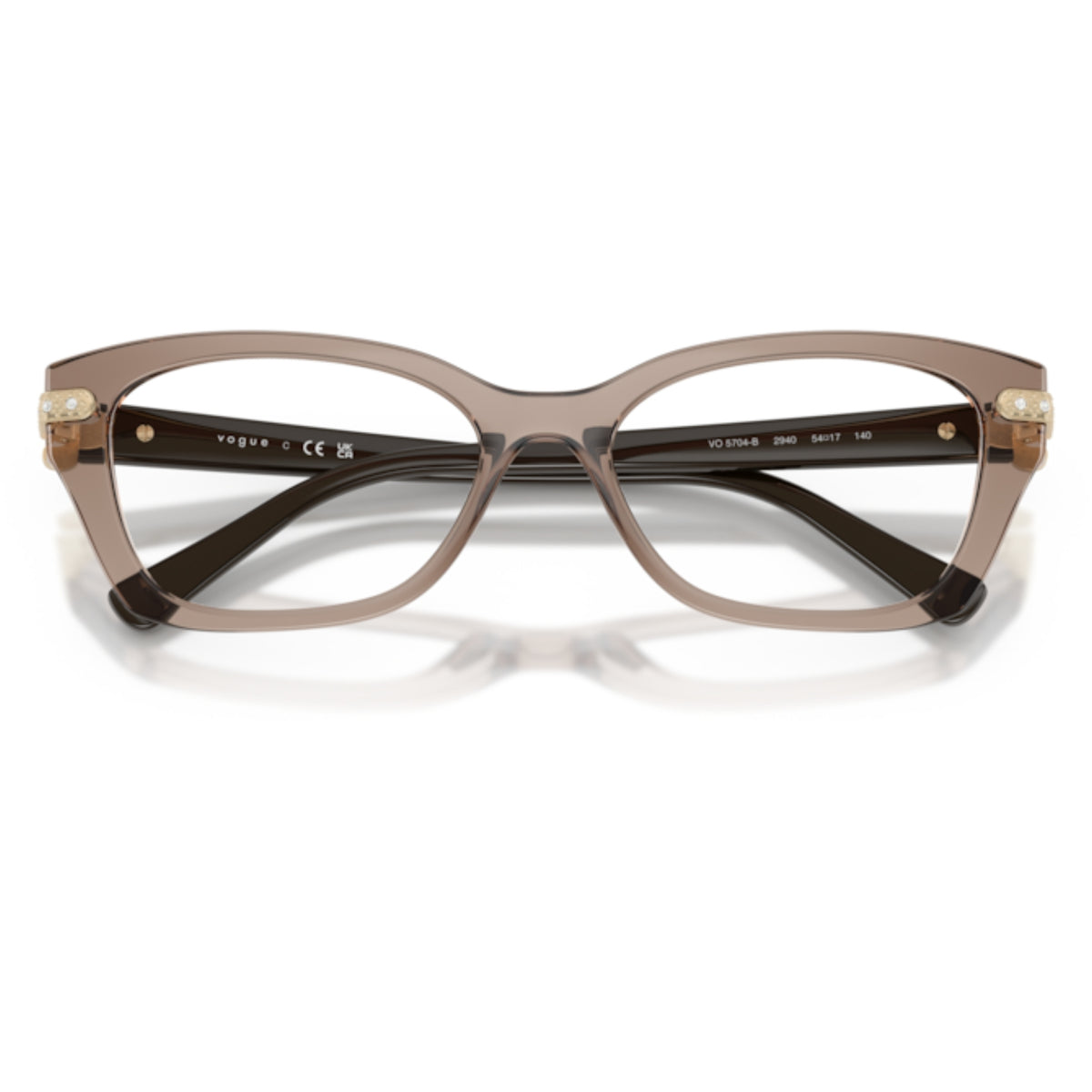 Vogue VO5704B transparent brown cat-eye eyeglasses, front view with the temples folded